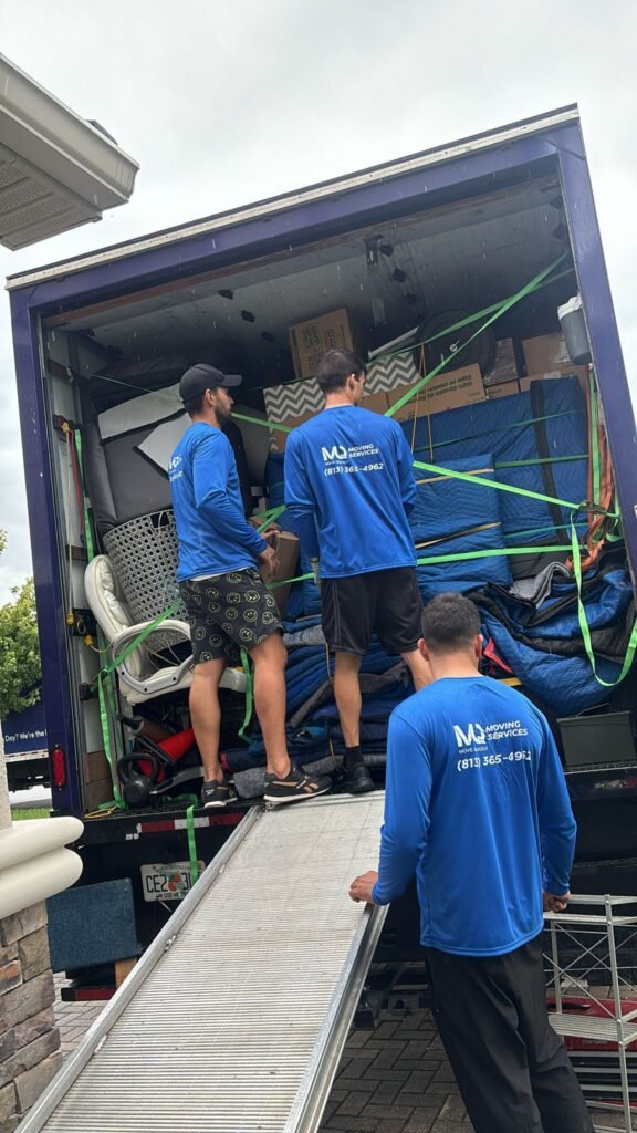 moving crew finishin stracking 26ft box truck move quickly team moving crew finishin stracking 26ft box truck
move quickly team